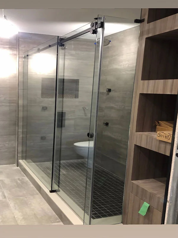Sliding System with Black Hardware Shower Glass